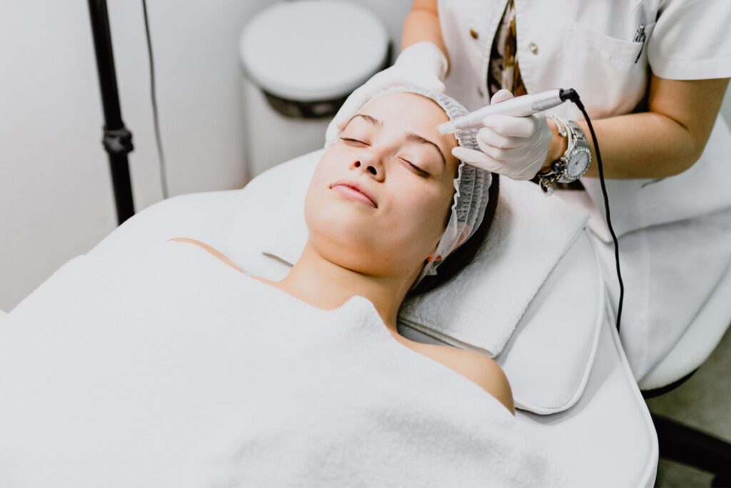Woman having a microneedling proceedure.