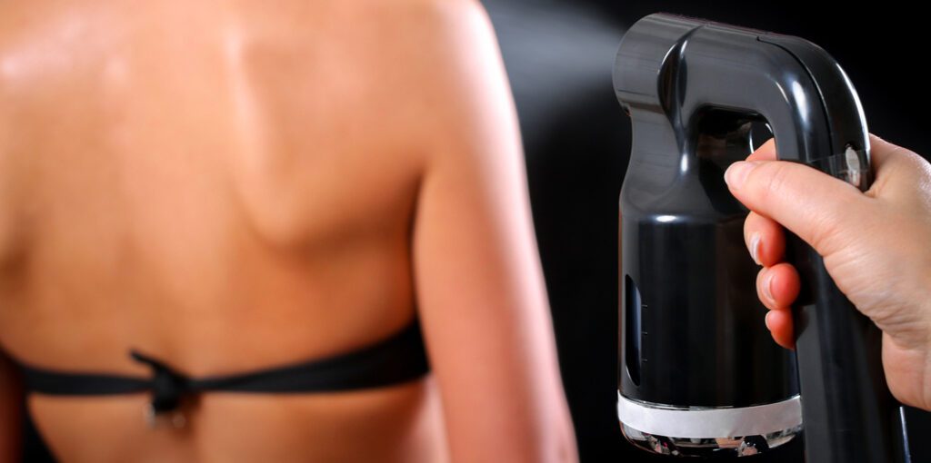 woman getting a spray tan