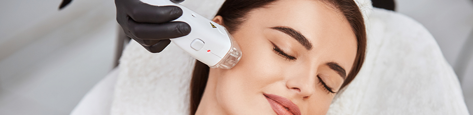 woman getting laser treatment on her face